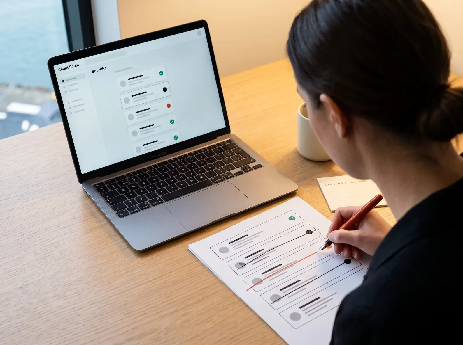 The Four Collaboration Surfaces of a Client Room — single-source shortlist versioning, structured client feedback capture, in-context conversation continuation, and mandate-scoped access control — as the architectural output of a mandate-as-workspace data model, replacing the fragmented pattern of email plus WhatsApp plus phone