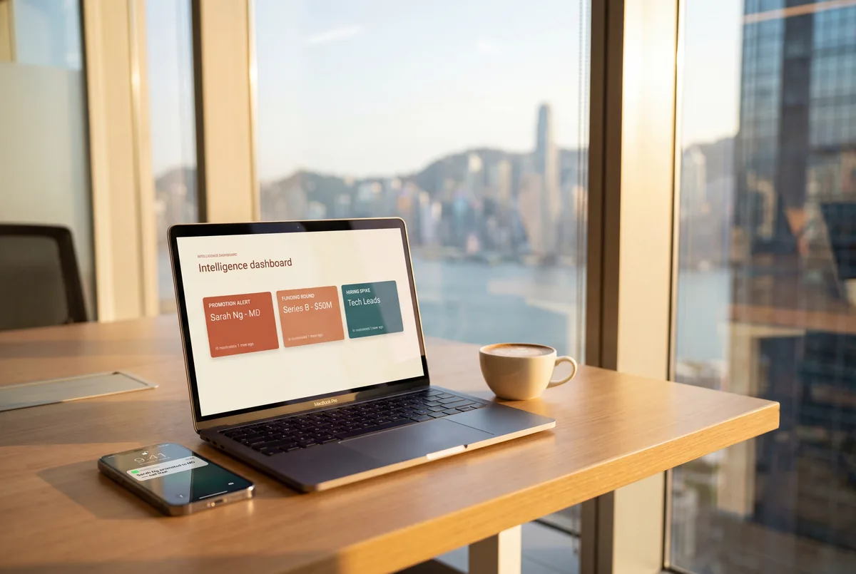 Intelligence dashboard showing BD signals on a laptop in a Hong Kong office